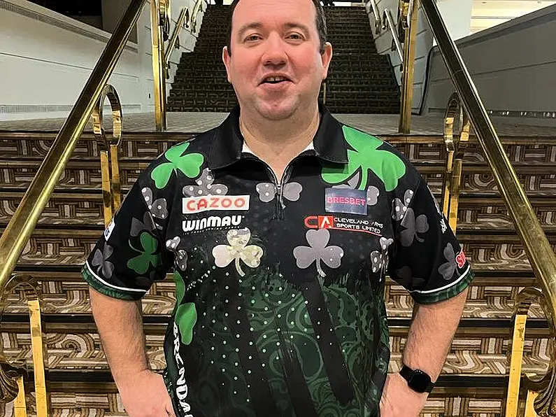 Brendan Dolan competes in World Cup of Darts