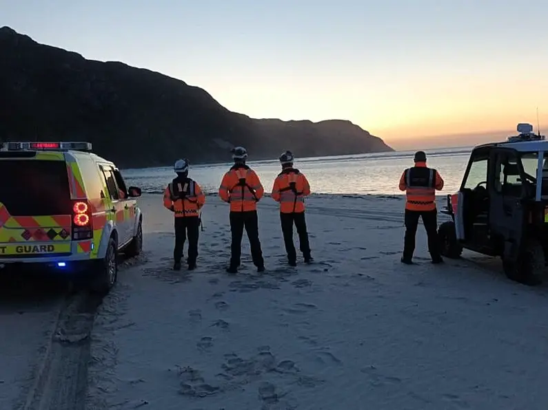 Three people and dog rescued from rocks at Maghera Strand