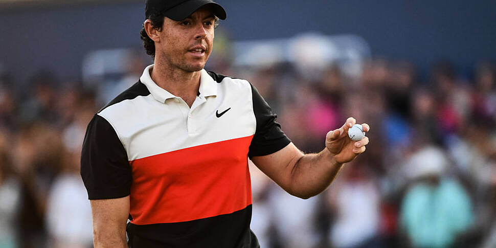 McIlroy back to official world...