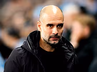Pep Guardiola signs a new two...