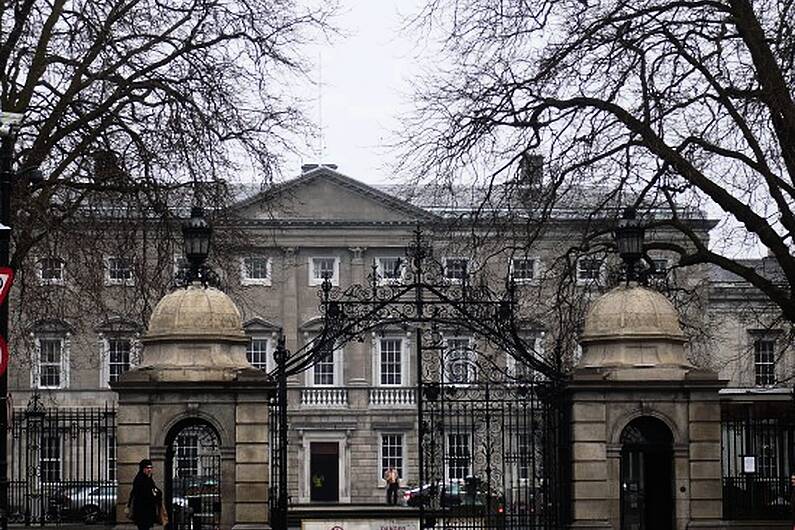 Government minister rejects claim the coalition is in crisis following TD departure