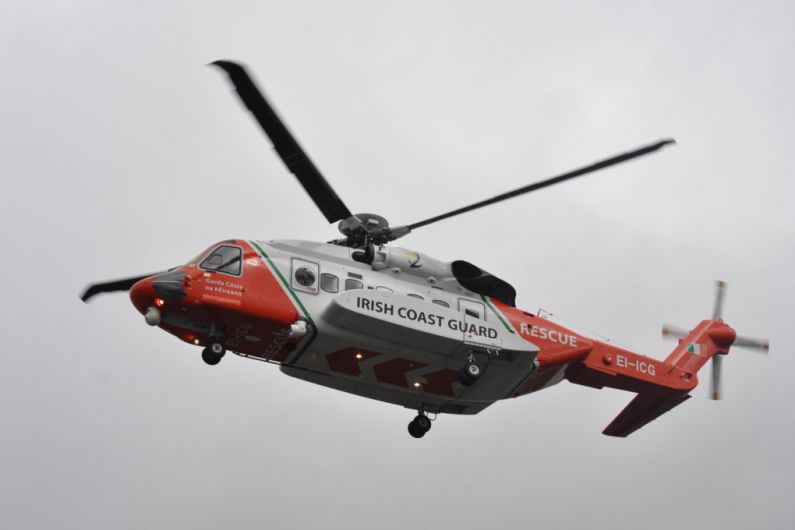 Coast Guard helicopter airlifts crewman to hospital