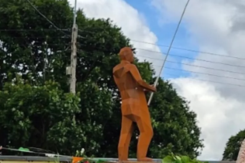 New fisherman sculpture revealed on banks of River Inny