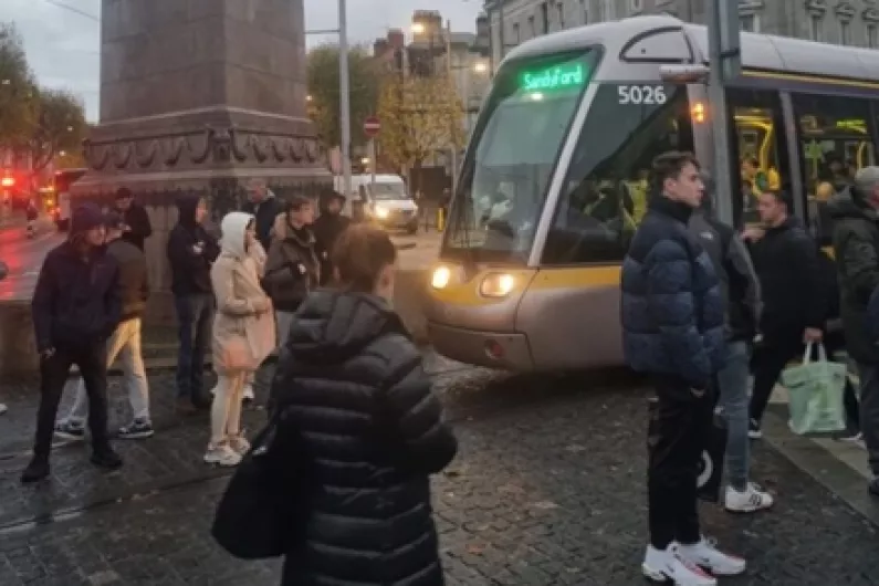 Riot police deployed in Dublin as Garda cars, Luas and Dublin Bus set alight