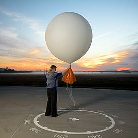 How do weather stations predict the weather? Image