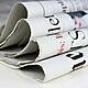 A look at today's business papers and markets