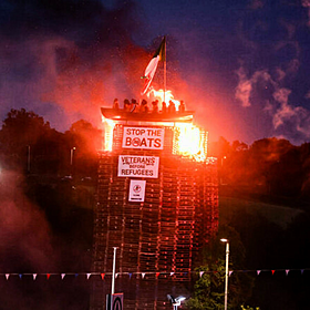Reaction as bonfire with effigies of migrants atop is lit in Co Tyrone Image