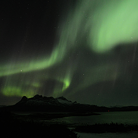 What causes an aurora borealis? Image