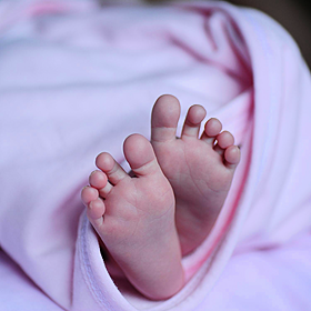 Safely using a baby sling Image