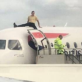 WE LOVE MOVIES - MAN ON PLANE Image