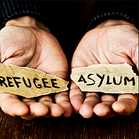 Should the criteria for taking in refugees be reevaluated? Image