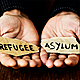 Should the criteria for taking in refugees be reevaluated?