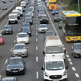 Why are so many using their phones while driving? Image