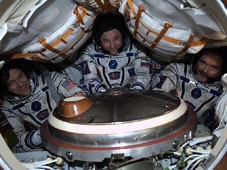 Astronaut Chris Hadfield and crew members safely return to Earth