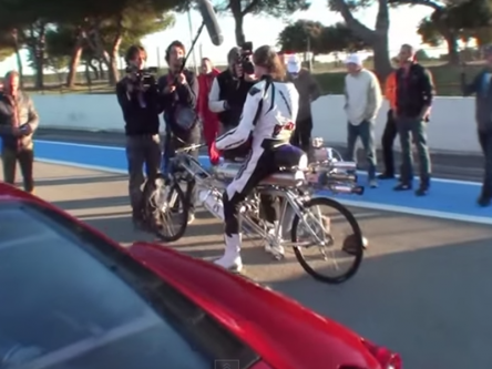 Rocket bicycle beats Ferrari at 333 km/h (video)