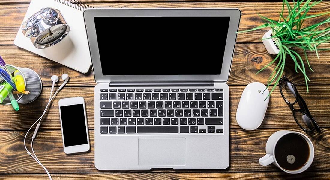 Laptop and desk arranged for online interview