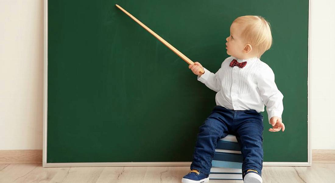 baby at blackboard