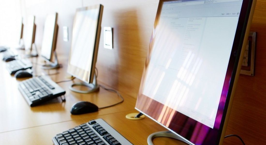 Digital Strategy for Schools: computers lined up on desk