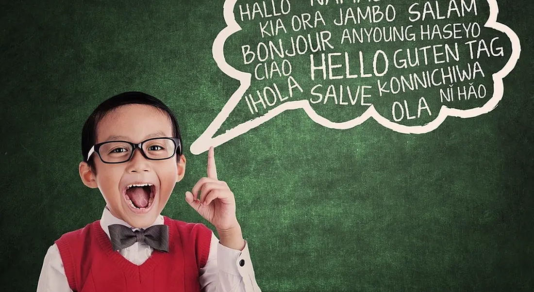 Language: Young boy and multilingual speech bubble