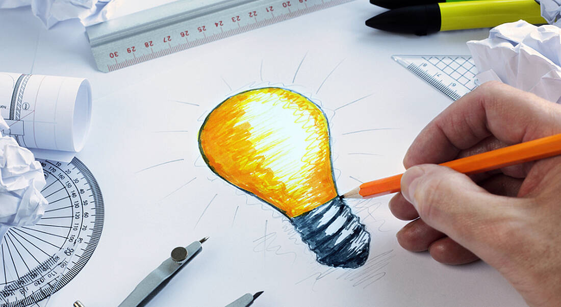 Engineers: student drawing lightbulb