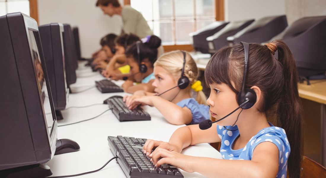 Children coding in the classroom
