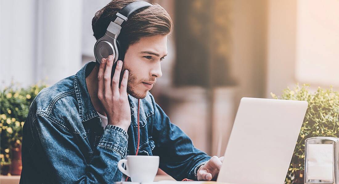 Man trying to stay focused at work