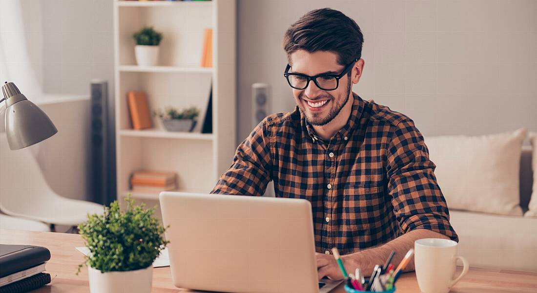 Man experiencing happiness at work.