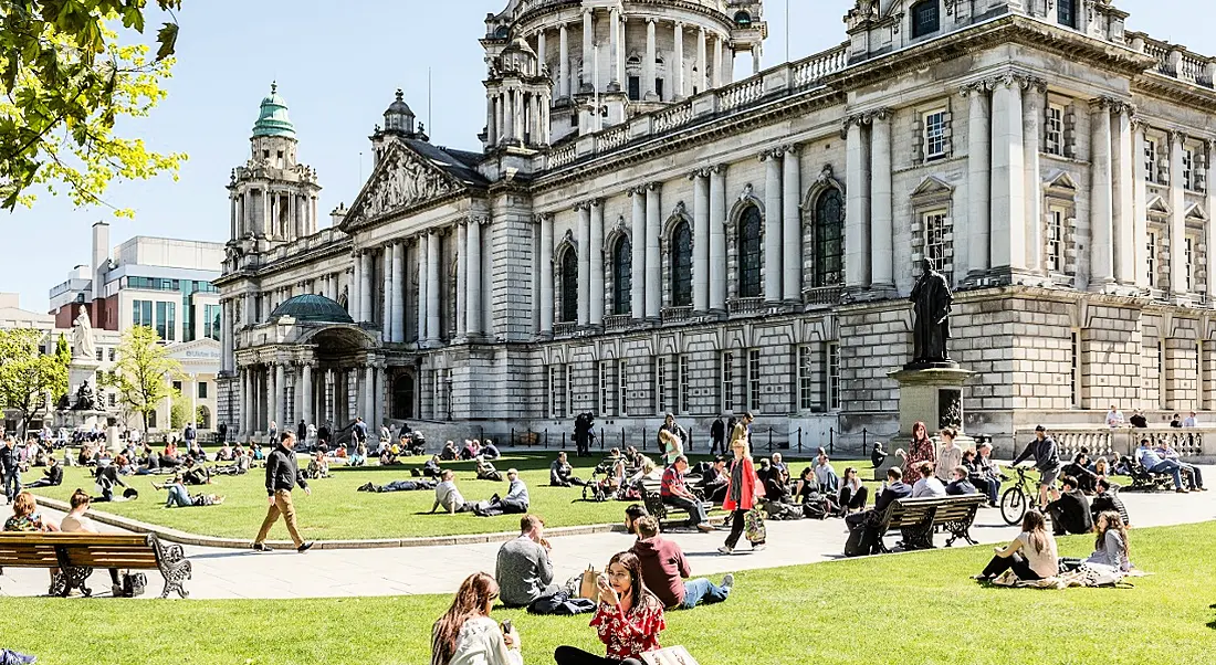 Belfast City Hall and grounds. Version 1 is building up its workforce in the city. Image: James Kennedy NI/Shutterstock