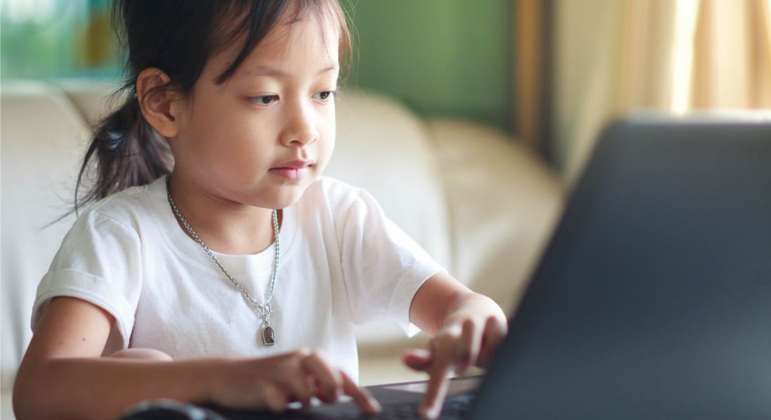 Talent gap: Young girl using computer