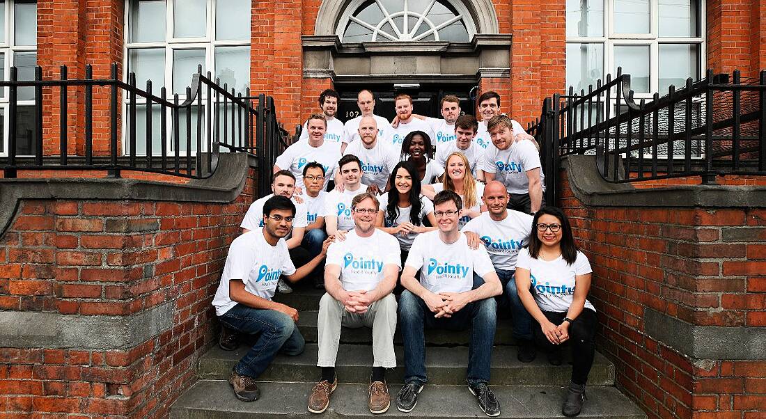 Team of Pointy people on steps of new Dublin HQ