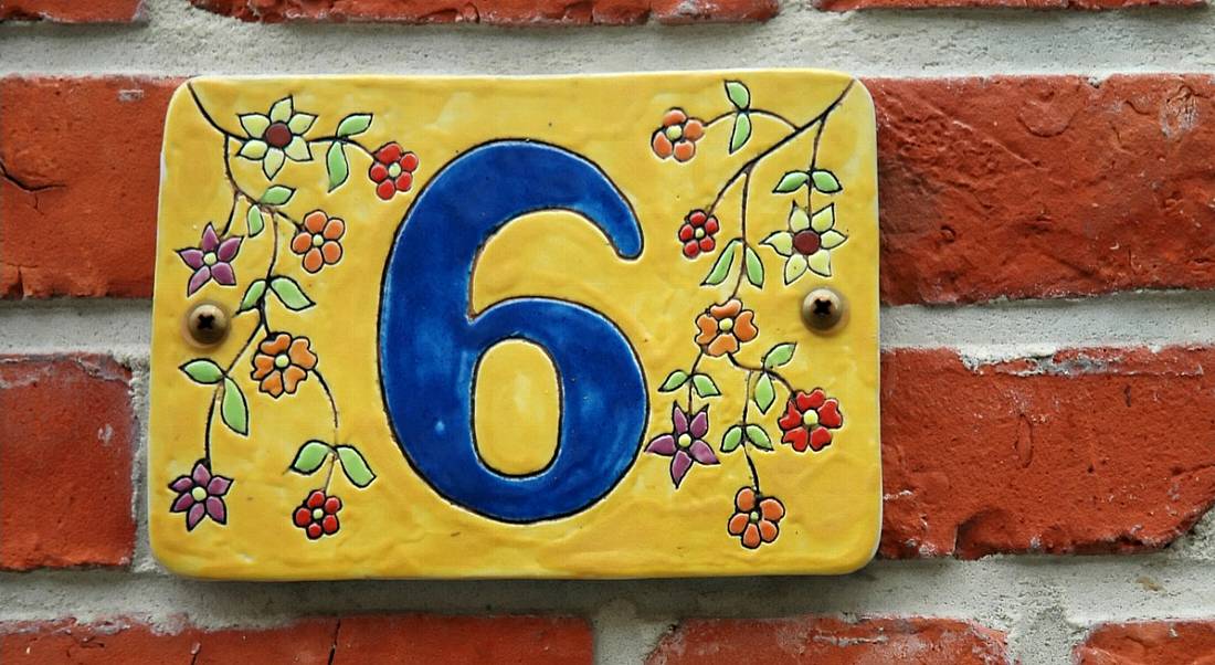 The number 6 on a wall for the number of data scientist tips