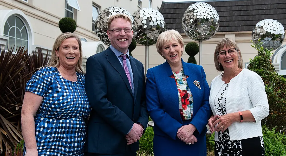 From L to R: Christina Kenny, chief people officer at Abtran; Pat Ryan, CEO at Abtran, Minister for Business Heather Humphires, TD; and Julie Sinnamon, CEO Enterprise Ireland Image: Rory Geary