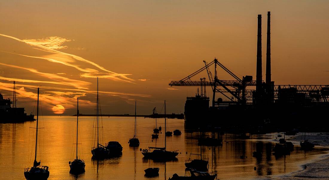 Sunrise at Dublin Port. Image: Paul Daly/Shutterstock.com EY report on economic growth in ROI and NI