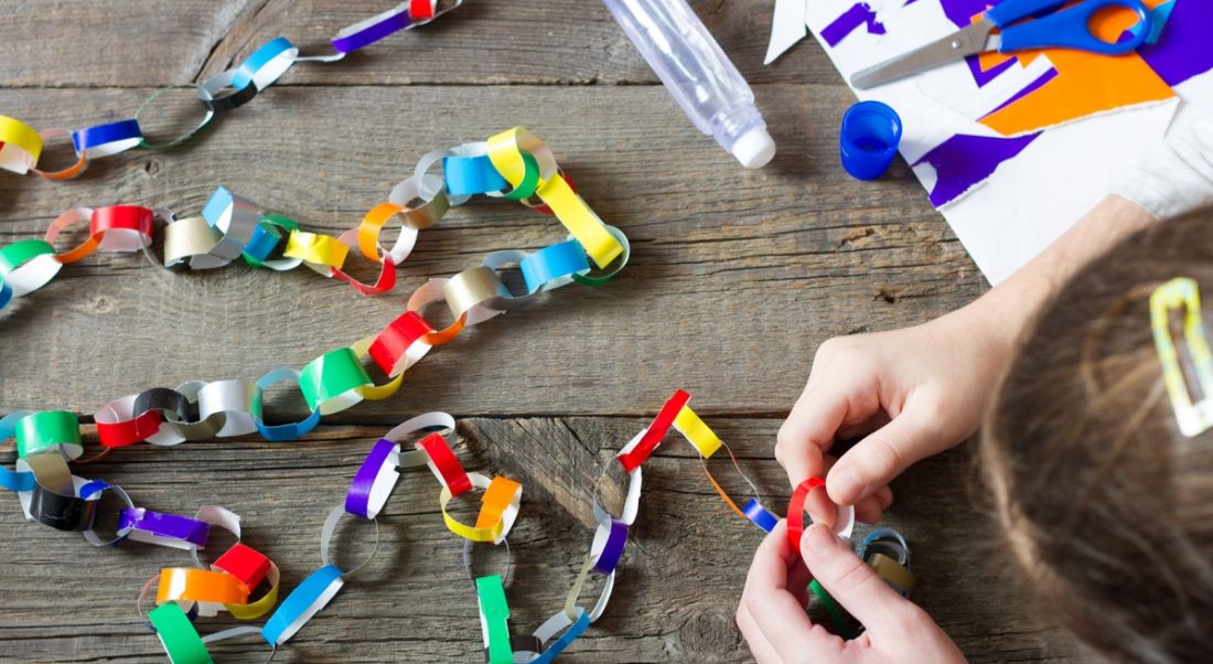 Colourful paper chain being built blockchain concept