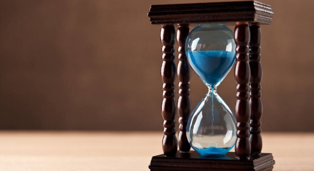 An hourglass showing the slow recruitment process that could cause companies to miss out on top talent.