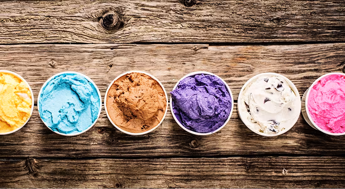 An assortment of colourful ice-cream tubs to symbolise the different graduate programme choices.