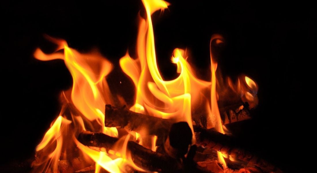 A close-up of a campfire against a black background representing the hottest tech jobs.