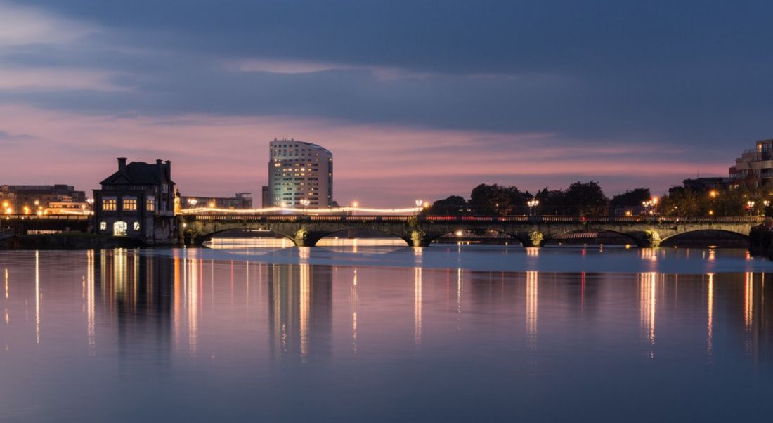 Beautiful view of Limerick city at night from the Shannon river.