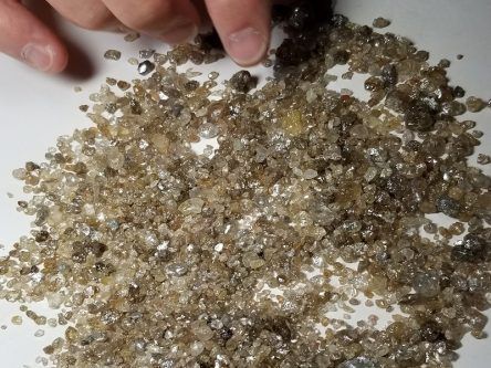 Super-deep diamond haul confirms subsurface reservoir older than the moon