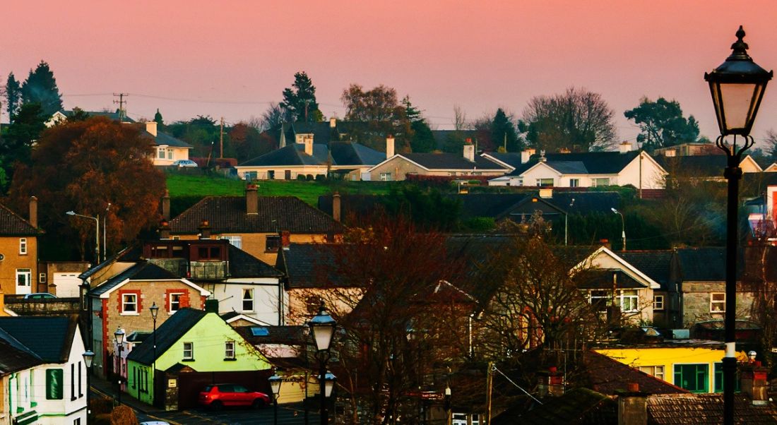 skyline image of Cashel, Tipperary, against a sunset.