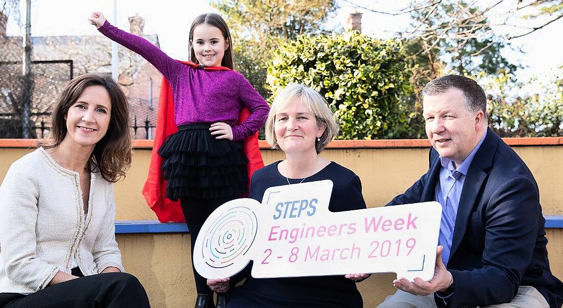 Two women and a man beside a little girl doing a superhero pose to mark launch of Intel and Engineers Ireland STEM skills initiative.