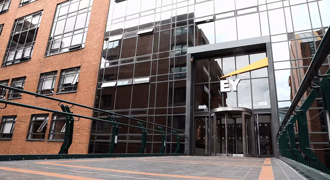 View of glass facade of EY building.