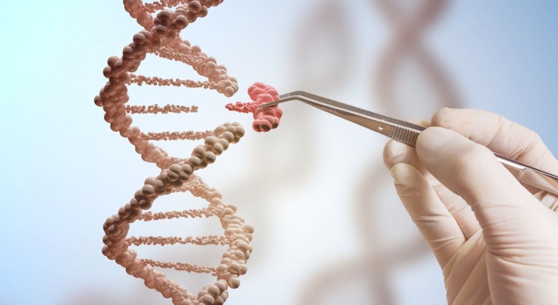 Visual of a DNA double-helix and a scientist's hands placing components in it with a tweezers.