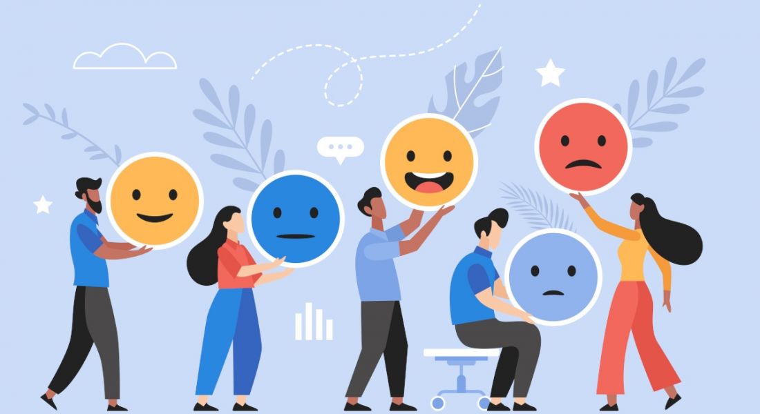 Cartoon of people participating in employee engagement surveys with workers holding giant emojis indicating whether they are happy, sad, angry or ambivalent.
