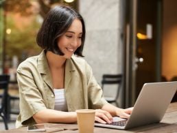 Two people are talking on a video call as part of a remote hiring process.