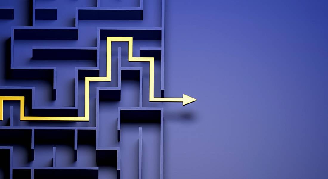 A yellow arrow moves through a purple maze, indicating clever problem-solving.