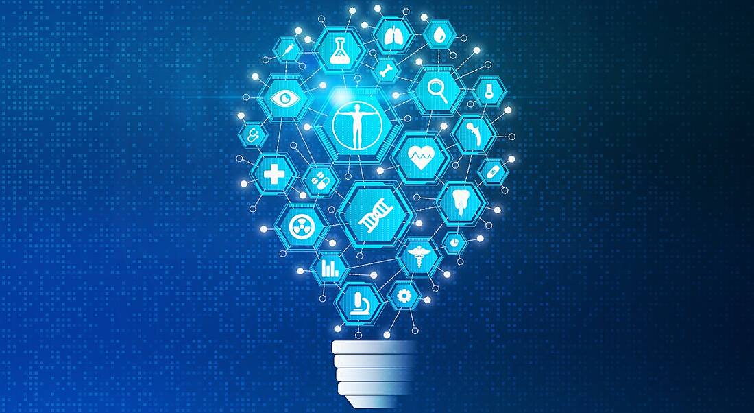 A blue light bulb with the factors of medtech built into the core, against a blue background.