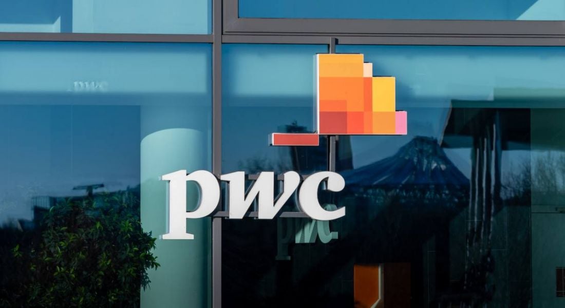 PwC logo on a glass building, taken in Berlin, Germany.