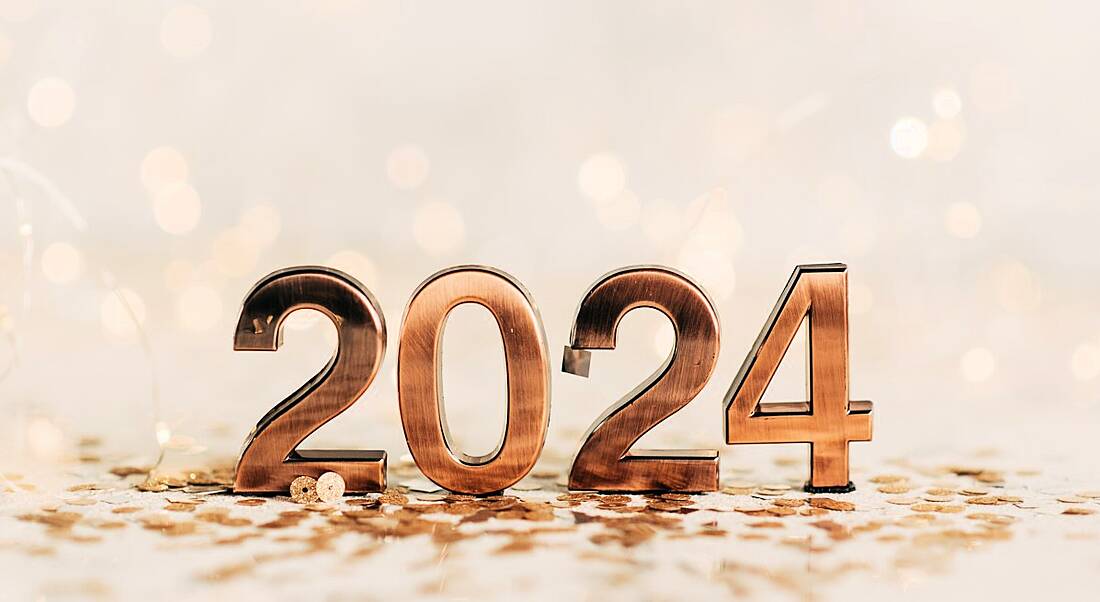 The numbers 2024 in gold letters on a pale gold background.