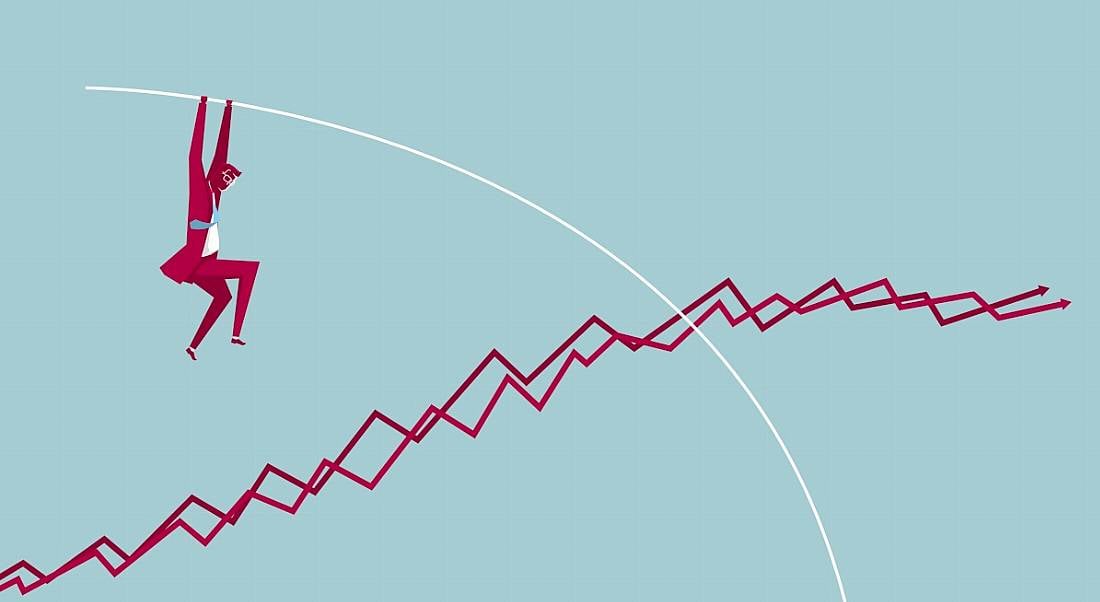 Cartoon showing concept of volatility in jobs markets with a person vaulting over some intertwined arrows on a graph.